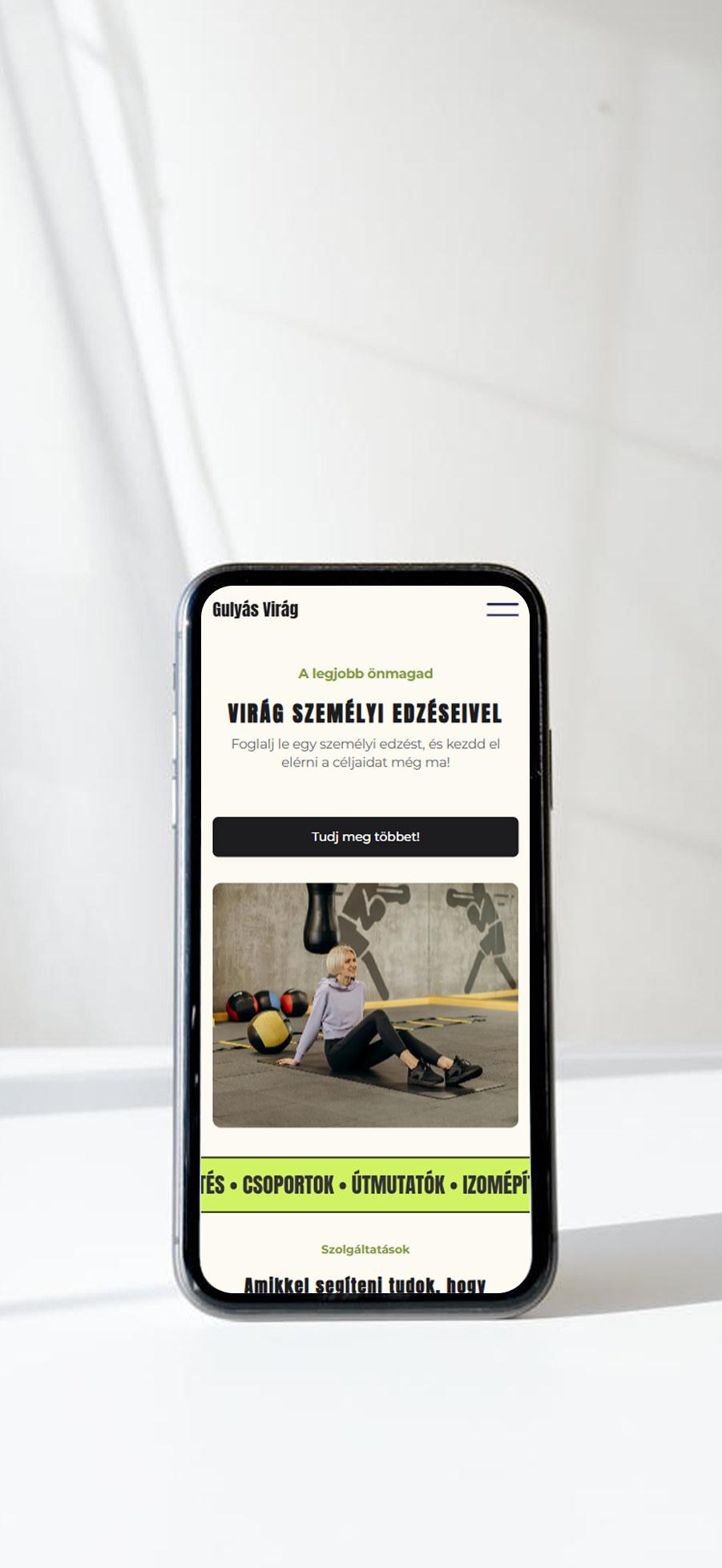 Mobile phone displaying a personal training booking page with a photo of a woman exercising in a gym.